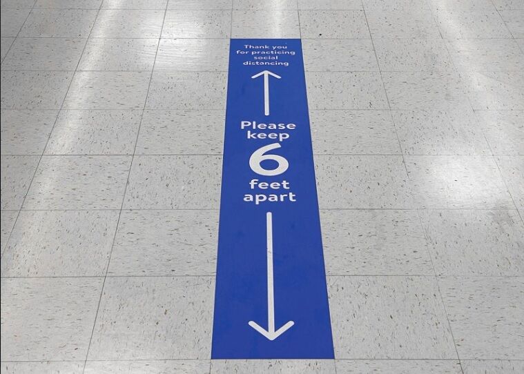 COVID floor sign
